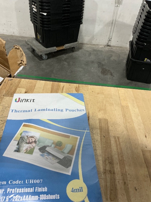 Photo 1 of **FACTORY SEALED** Uinkit 100 Pack Thermal Laminating Pouches 4mil Hold 11x17 inches Menu Tabloid Size Laminating Sheets 11.5X17.5inches Clear Glossy, Lamination Sheets Paper for Laminator Rounded Corner