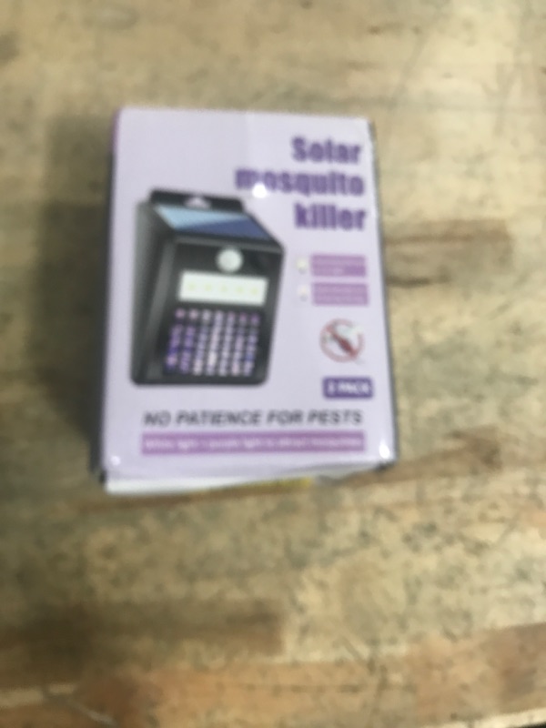 Photo 1 of 2 Pack of Solar Mosquito Zapper & Outdoor Light - 1000V Electric Bug Trap, Solar-Powered Fly Killer with Motion Sensor, Waterproof & Cordless