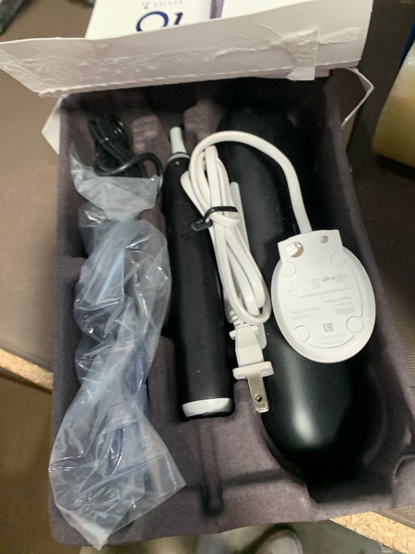 Photo 1 of ***(PARTS ONLY/ NON FUNCTIONAL)***Oral-B iO Deep Clean + Protect Rechargeable Electric Toothbrush, Black with a iO Series 7 Toothbrush, 2 Replacement Brush Heads, and a Charging Travel Case