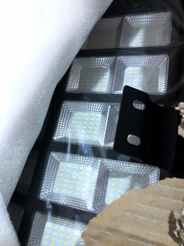 Photo 1 of **************1 OF THE LIGHT's SOLAR PANL IS BROKEN***************
Jadisi 2-Pack Solar Street Light -9000W Solar Street Lights Outdoor 120000LM,7000K Commercial Parking Lot Light, Flood Outdoor Lights IP66 Waterproof with Motion Sensor, 3-Year Warranty