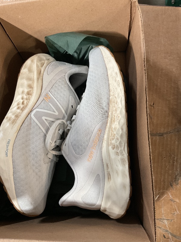 Photo 1 of * bottom of shoes are dirty *
New Balance Women's Fresh Foam Arishi V4 Running Shoe, Summer Fog/Nimbus Cloud/Light Gold Metallic, 7.5