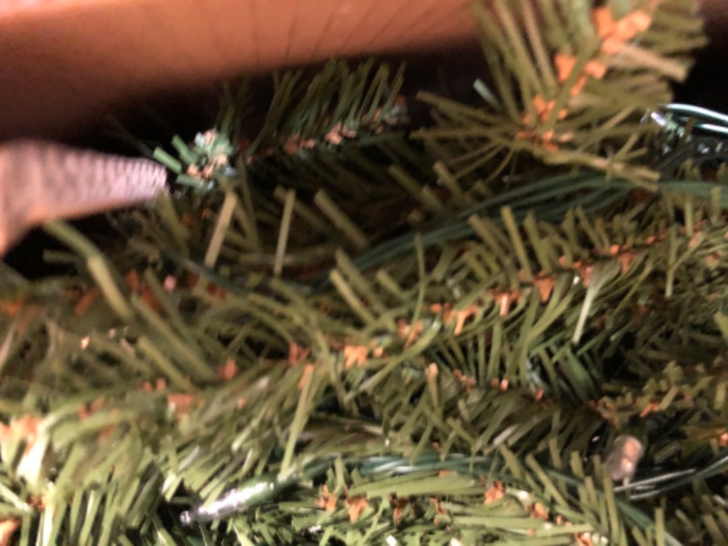 Photo 1 of ******************broken wire and the tree doesn’t light up**************
National Tree Company Pre-Lit Artificial Full Christmas Tree, Green, Dunhill Fir, Dual Color LED Lights, Includes Stand, 9 Feet