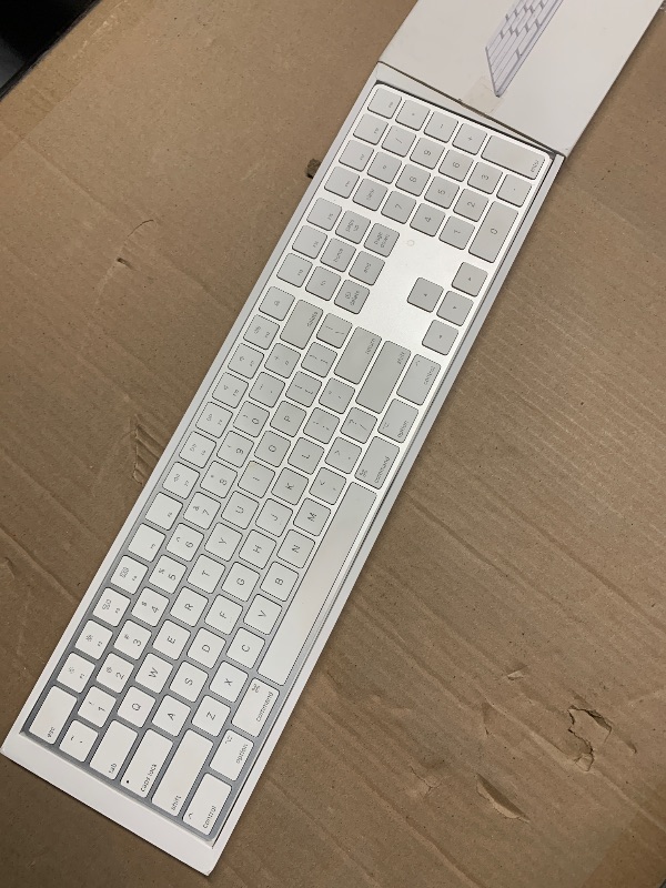 Photo 1 of **SEE NOTES** Apple Magic Keyboard with Numeric Keypad: Wireless, Bluetooth, Rechargeable. Works with Mac, iPad, or iPhone; US English - White