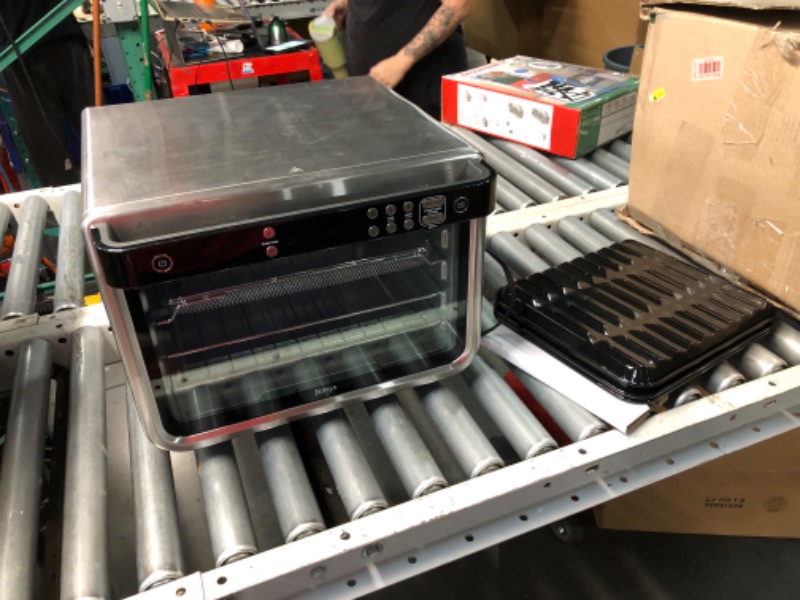 Photo 1 of ***DAMAGED - CRUSHED - SEE PICTURES***
Ninja DT251 Foodi 10-in-1 Smart XL Air Fry Oven, Bake, Broil, Toast, Roast, Digital Toaster, Thermometer, True Surround Convection up to 450°F, includes 6 trays & Recipe Guide, Silver