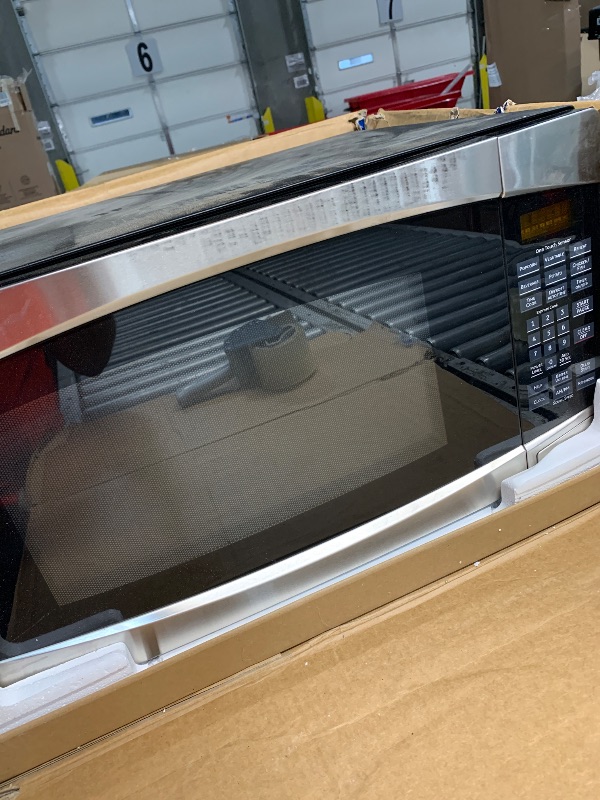 Photo 1 of (used)(missing pieces)(see images) GE Countertop Microwave Oven, 1,200-watt Capacity, 2.0 Cubic Ft., 8 Auto Setting Cooking Settings, Child-Lock Technology