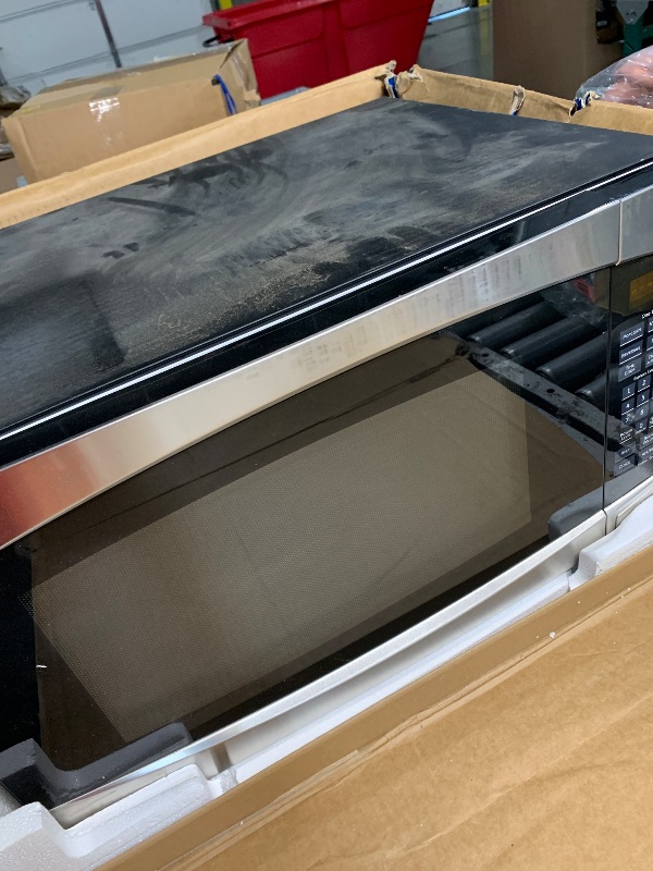 Photo 1 of (used)(missing pieces)(see images) GE Countertop Microwave Oven, 1,200-watt Capacity, 2.0 Cubic Ft., 8 Auto Setting Cooking Settings, Child-Lock Technology