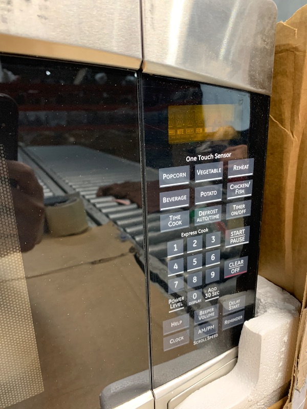 Photo 1 of (used)(missing pieces)(see images) GE Countertop Microwave Oven, 1,200-watt Capacity, 2.0 Cubic Ft., 8 Auto Setting Cooking Settings, Child-Lock Technology