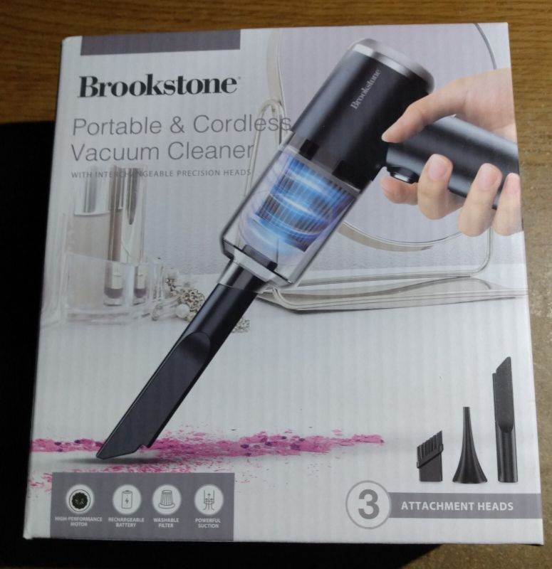Photo 1 of ***(PARTS ONLY/ NON FUNCTIONAL)***Brookstone Small Portable Cordless Vacuum - Interchangeable Precision Heads