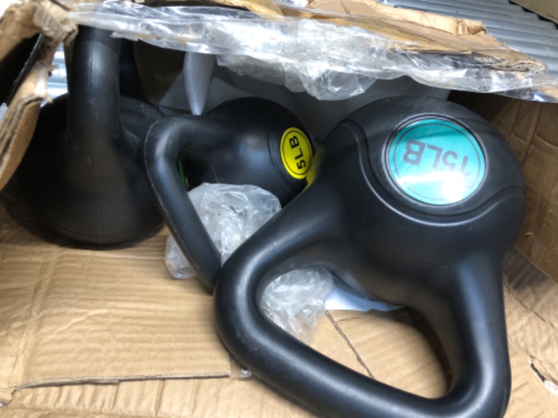 Photo 1 of ?Signature Fitness ?Wide Grip 4-Piece Kettlebell Exercise Fitness Weight Set, Include 5 lbs, 10 lbs?, ?15 lbs? and 20 lbs, Black