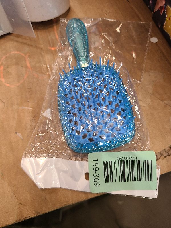 Photo 1 of  Heat UNbrush Mini Detangler Brush for Pain-Free Brushing on All Wet or Dry Hair Types — Durable Duoflex Anti-Static Bristles, Lightweight Handle, Vented Mini Hair Brush, Sapphire Blue