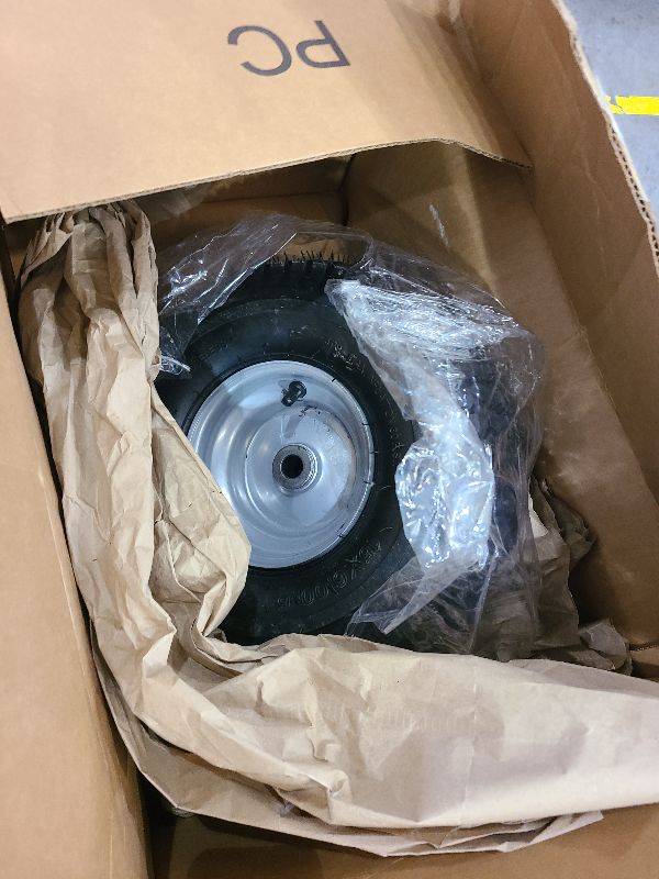 Photo 1 of 15x6.00-6nhs Lawn Mower Front Tire 4 Ply Tubeless 15x6x6 Lawn Mower 570 Lbs Tire and Wheel with 3/4" Bushing and 12 Spacers