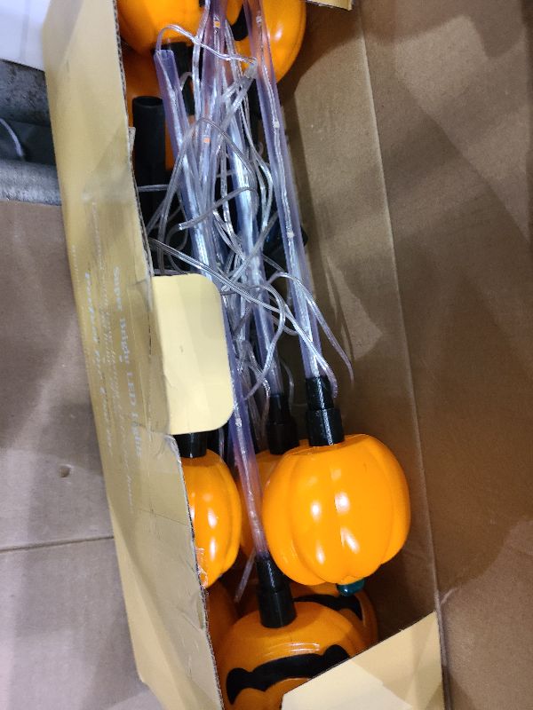 Photo 1 of 12 Pack Solar Pumpkin Lights for Halloween Decorations Outdoor, Waterproof Halloween Pathway Lights with 8 Modes, Orange Purple and Green Halloween Walkway Stake Lights for Yard Garden Party Decor