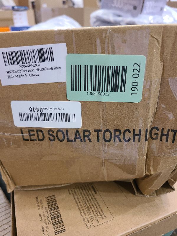 Photo 1 of 10 Pack Solar Lights Outdoor, Mini Solar Torch Lights with Flickering Flame for Halloween Decor, Solar Halloween Lights Waterproof Solar Powered Outdoor Lights for Garden Pathway Patio Yard Porch