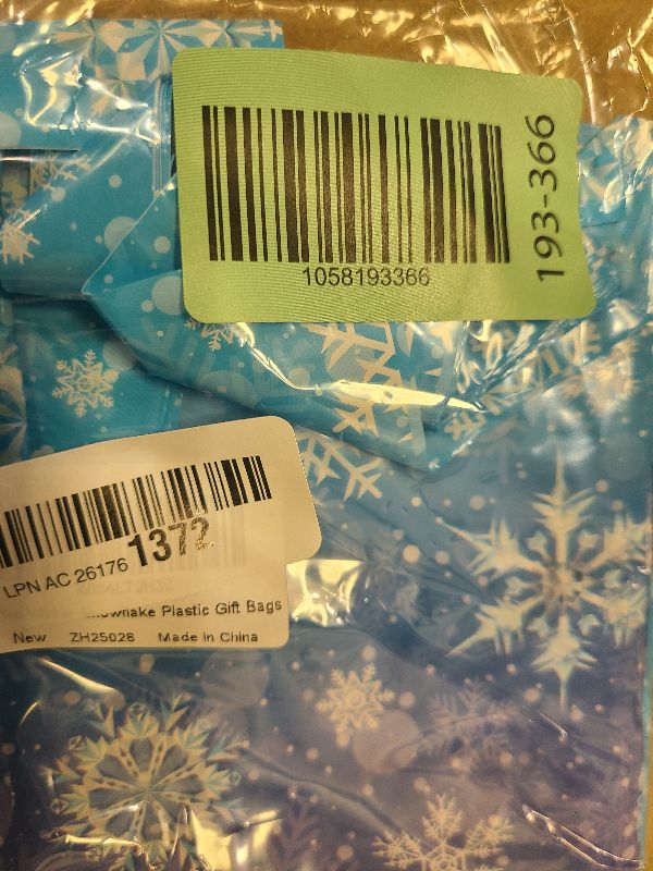 Photo 1 of 50 Pcs Winter Snowflake Party Favor Bags, Blue and Purple Snowflake Goodie Bags Bulk with Handles, Holiday Plastic Gift Candy Bag for Birthday Christmas Winter Wonderland Party Supplies