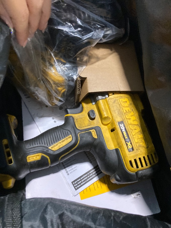 Photo 1 of ***VERY UDES***
DEWALT 20V MAX Cordless Impact Wrench Kit, 20V MAX, 1/2" Hog Ring With 4-Mode Speed, Includes Battery, Charger and Kit Bag (DCF900P1)