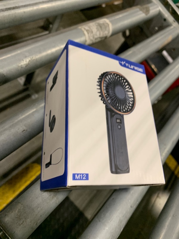 Photo 1 of **MISSING CHARGER** TUNISE Portable Handheld Fan, 4000mAh, 180 Adjustable, 6 Speed Wind, USB Rechargeable Foldable Fan with Real-Time Display