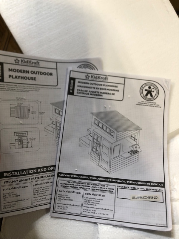 Photo 1 of  *** USED / MISSING PARTS/ small detail ** 
 KidKraft Modern Outdoor Wooden Playhouse with Picnic Table, Mailbox and Outdoor Grill, White