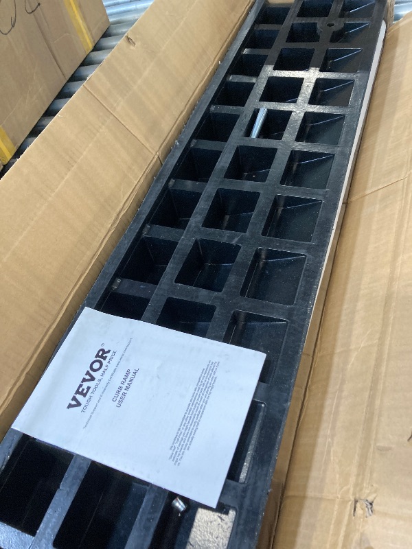 Photo 1 of ** USED *** 
VEVOR Rubber Curb Ramp, 3.7" Rise Height Sidewalk Threshold Ramp, 10" Width 39.4" Length Driveway Ramp for Curb, Forklifts, Trucks, Buses, Cars, Wheelchairs, Bikes