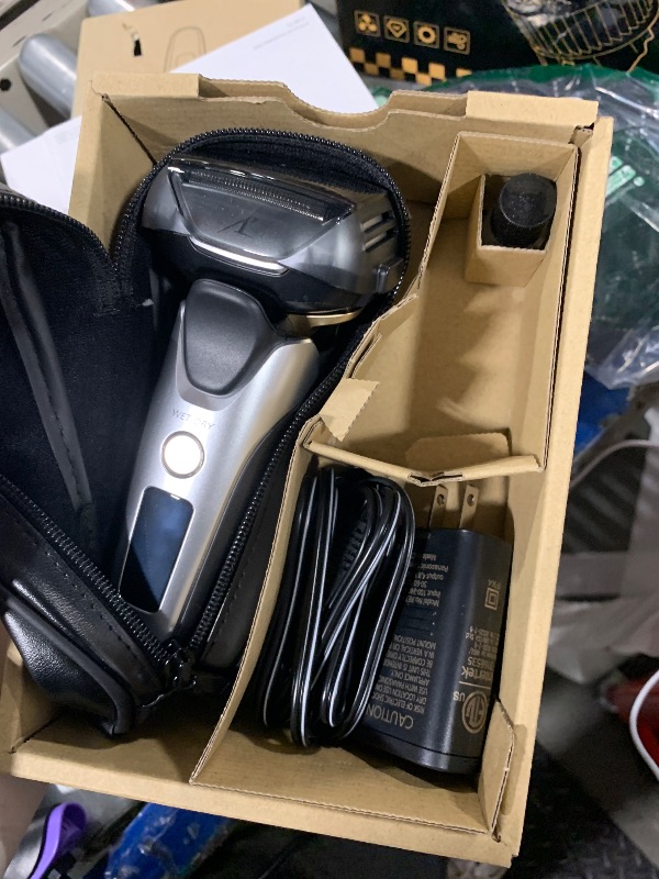 Photo 1 of ** VERY USED*** Panasonic ARC5 Electric Razor for Men with Pop-up Trimmer, Wet Dry 5-Blade Electric Shaver with Intelligent Shave Sensor and 16D Flexible Pivoting Head - ES-ALV6HS (Silver)