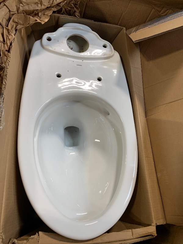 Photo 1 of ** USED / MISSING PARTS / ONLY THE RATE/ UNTESTED **
TOTO® Nexus® 1G® Two-Piece Elongated 1.0 GPF Universal Height Toilet with CEFIONTECT® and SS124 SoftClose Seat, WASHLET®+ Ready, Cotton White - MS442124CUFG#01