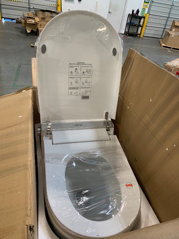 Photo 1 of ** DEMAGE MINOR/ USED/ UNTESTED *** MEJE #A5 - Basic Smart Function Toilet with Built-in Heated Seat, Elongated Tankless Toilet with Auto Flushing, Foot Kick Flushing, Adjustable Seat Temperature, Flush Remote Control, Night Light