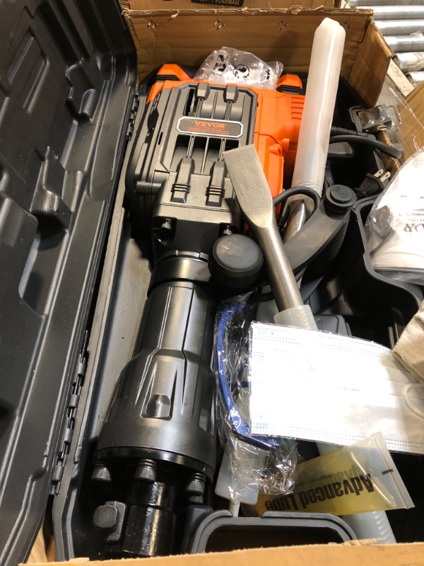 Photo 1 of ** USED / UNTESTED *** VEVOR 3500W Electric Demolition Hammer, 1900 BPM Durable Jack Hammer, Concrete Breaker with 2 Chisels, Gloves, and a 360° Rotatable Handle for Efficient Trenching, Black