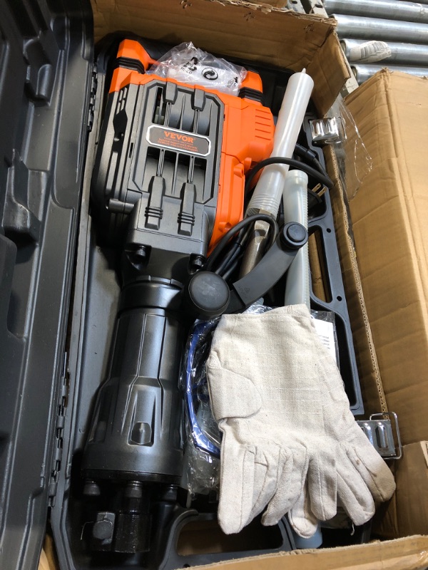 Photo 1 of ** USED / UNTESTED *** VEVOR 3500W Electric Demolition Hammer, 1900 BPM Durable Jack Hammer, Concrete Breaker with 2 Chisels, Gloves, and a 360° Rotatable Handle for Efficient Trenching, Black