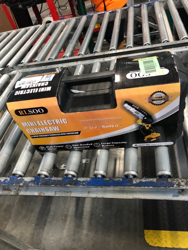 Photo 1 of ***MISSING CHARGER*** Mini Chainsaw, RLSOO 6-Inch Electric Chainsaw Cordless, Portable Small Handheld Chain Saw for Wood Cutting, Tree Trimming, Courtyard, Household, and Garden (Includes 2 Batteries and 3 Chains)