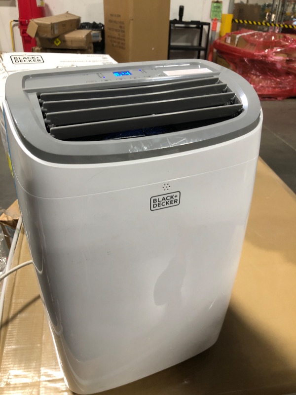 Photo 1 of *****it works perfectly****** BLACK+DECKER Portable Air Conditioner, 9,000 BTU (5,300 BTU SACC) for Rooms up to 400 Sq. Ft., Portable AC with Follow Me Remote Control and Window Kit, BPACT08WT, White