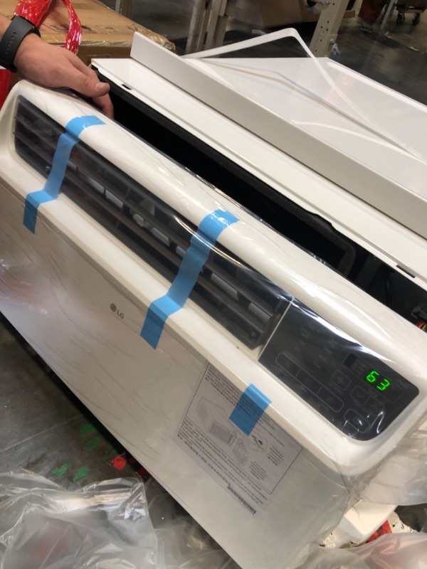 Photo 1 of ******turns on perfectly***** LG 14,000 BTU DUAL Inverter Smart Window Air Conditioner, 115V, Cools 700 Sq. Ft. for Bedroom, Living Room, Apartment, Quiet Operation, ENERGY STAR, works with LG ThinQ, Amazon Alexa and Hey Google