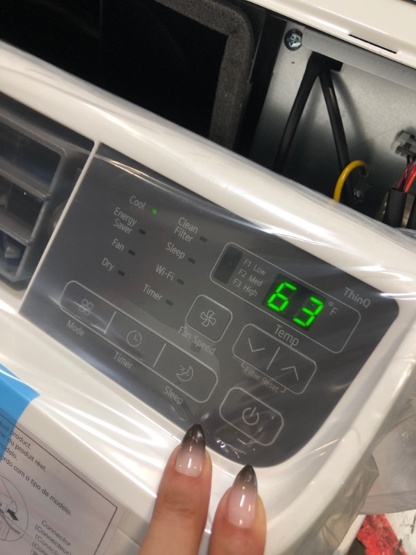 Photo 1 of ******turns on perfectly***** LG 14,000 BTU DUAL Inverter Smart Window Air Conditioner, 115V, Cools 700 Sq. Ft. for Bedroom, Living Room, Apartment, Quiet Operation, ENERGY STAR, works with LG ThinQ, Amazon Alexa and Hey Google