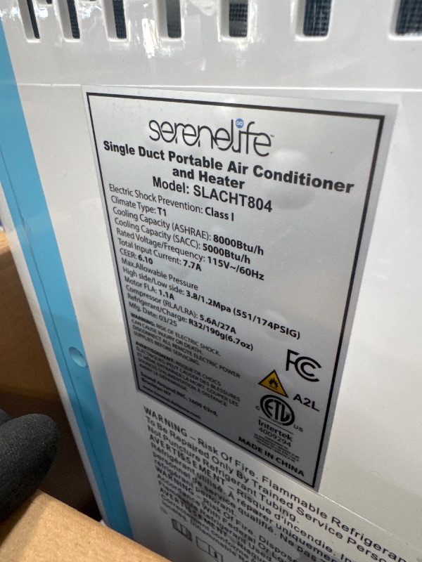 Photo 1 of *****it turns on perfectly***** SereneLife 8000 BTU Portable Air Conditioner with Heat, Compact 4-in-1 Portable AC & Heater for Room Up to 350 Sq Ft with Dehumidifier & Fan Function, Remote Control, Window Mount Kit, 13" x 11" x 26"