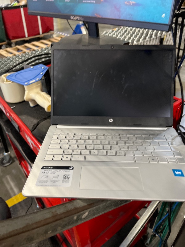 Photo 1 of **FOR PARTS** HP 14 inch Laptop, HD Touchscreen Display, Intel Celeron N4500, 4 GB RAM, 64 GB eMMC, Intel UHD Graphics, Windows 11 Home in S Mode, Natural Silver, 14-dq3550nr