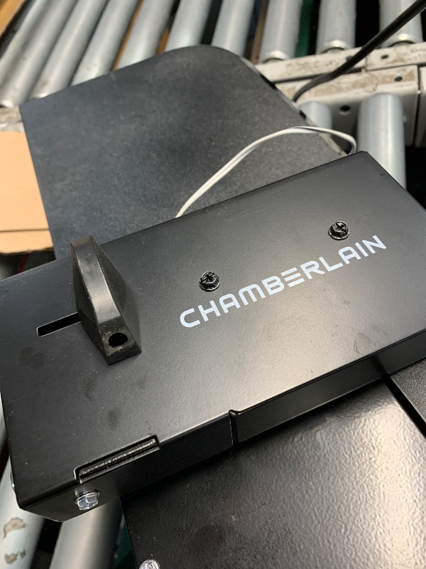 Photo 1 of (used)(incomplete) CHAMBERLAIN RJO101MC Ultra-Quiet Wall Mounted with Battery Backup and LED Lighting Garage Door Opener, 36 pounds, Black