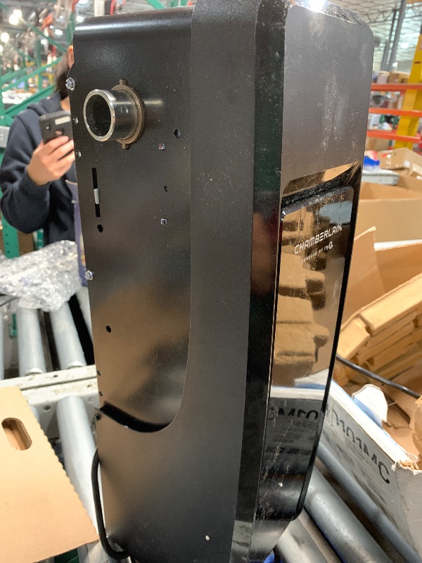 Photo 1 of (used)(incomplete) CHAMBERLAIN RJO101MC Ultra-Quiet Wall Mounted with Battery Backup and LED Lighting Garage Door Opener, 36 pounds, Black