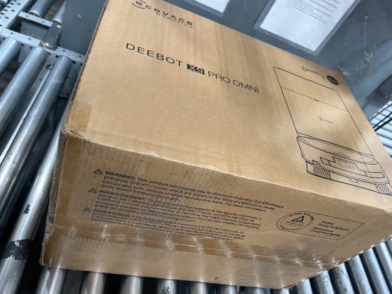 Photo 1 of ***(USED/ UNKNOWN IF MISSING PARTS/ UNABLE TO TEST ITEM)***ECOVACS DEEBOT X9 PRO Omni Robot Vacuum and Mop,16,600Pa Blast Suction, OZMO Roller Instant Self-Washing Mopping, ZeroTangle 3.0, Triple Lift System, AI Smart Navigation, Hands-Free Omni Station