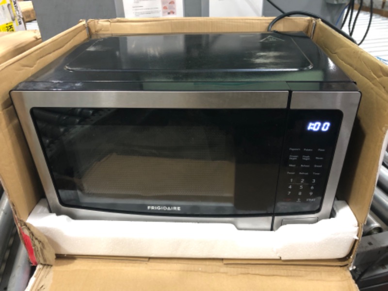 Photo 1 of FRIGIDAIRE Stainless Steel Microwave Oven, Multi Function, Programmable, 1.1 Cu Ft 1000-Watt