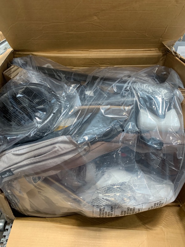 Photo 1 of Evenflo Pivot Modular Travel System with LiteMax Infant Car Seat with Anti-Rebound Bar (Desert Tan)