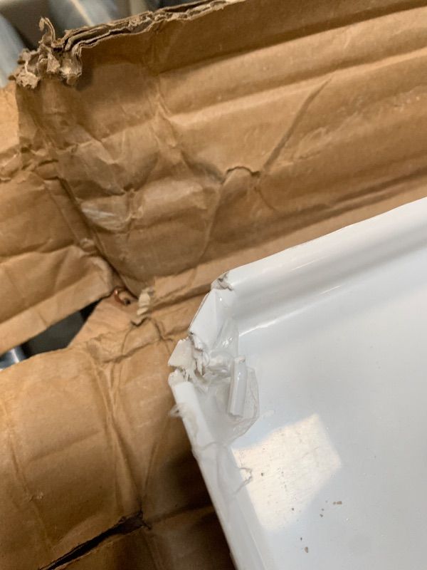 Photo 1 of **damage in one corner**
DreamLine SlimLine 32 in. D x 60 in. W x 2 3/4 in. H Center Drain Single Threshold Shower Base in White, DLT-1132600