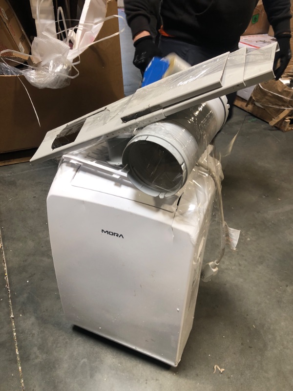 Photo 1 of ******TURNS ON PERFECTLY***** DONT HAVE CONTROL Mora Mora by Hisense Smart 7,000 BTU (DOE), 10,300 BTU (ASHRAE), 300 SF Portable AC, 3 Operating Modes (Cool, Dry, Fan), Remote and Window Vent Installation Kit Included, Goole Home & Alexa Support