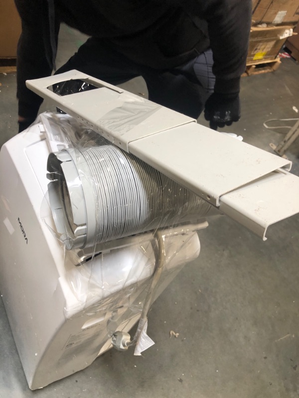 Photo 1 of ******TURNS ON PERFECTLY***** DONT HAVE CONTROL Mora Mora by Hisense Smart 7,000 BTU (DOE), 10,300 BTU (ASHRAE), 300 SF Portable AC, 3 Operating Modes (Cool, Dry, Fan), Remote and Window Vent Installation Kit Included, Goole Home & Alexa Support