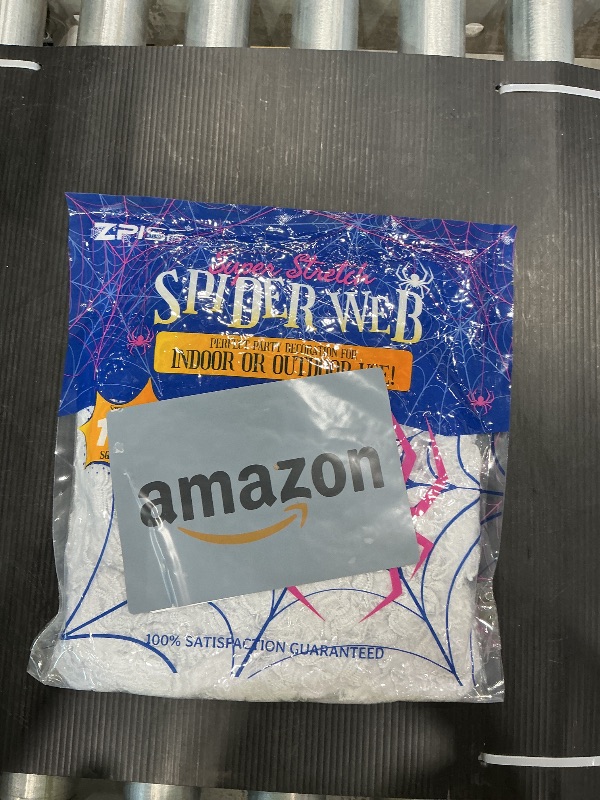 Photo 1 of 1000 sqft Spider Webs Halloween Decorations Bonus with 30 Fake Spiders, Super Stretch Cobwebs for Halloween Indoor and Outdoor Party Supplies