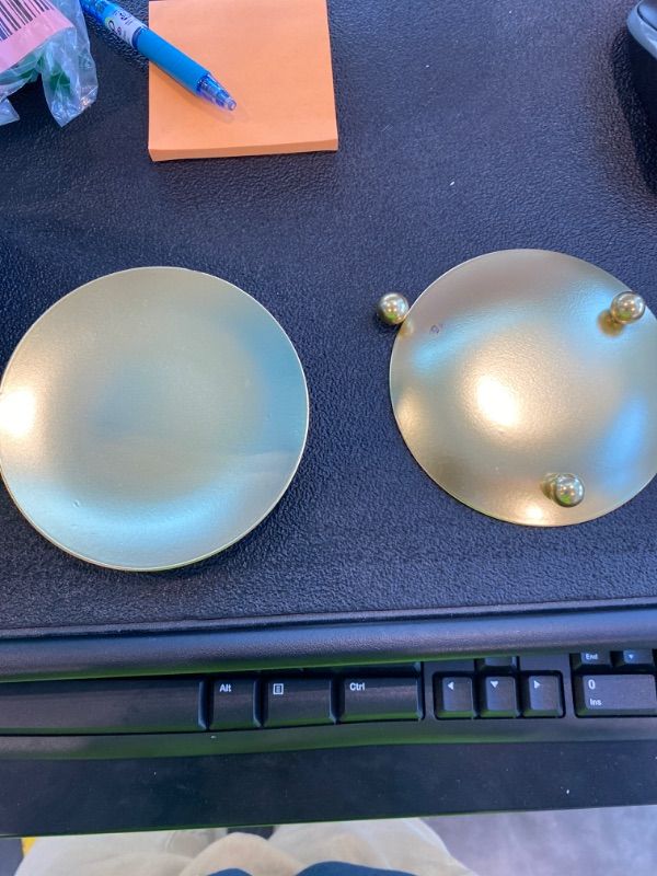 Photo 1 of ***MINOR DAMAGE*** YYaaloa 2 Pack Gold Decorative Iron Plate Candle Holder 4.33'' Candle Stand Candle Plate for LED & Wax Candles, Incense Cones, Spa, Weddings (Gold-2 Pack)