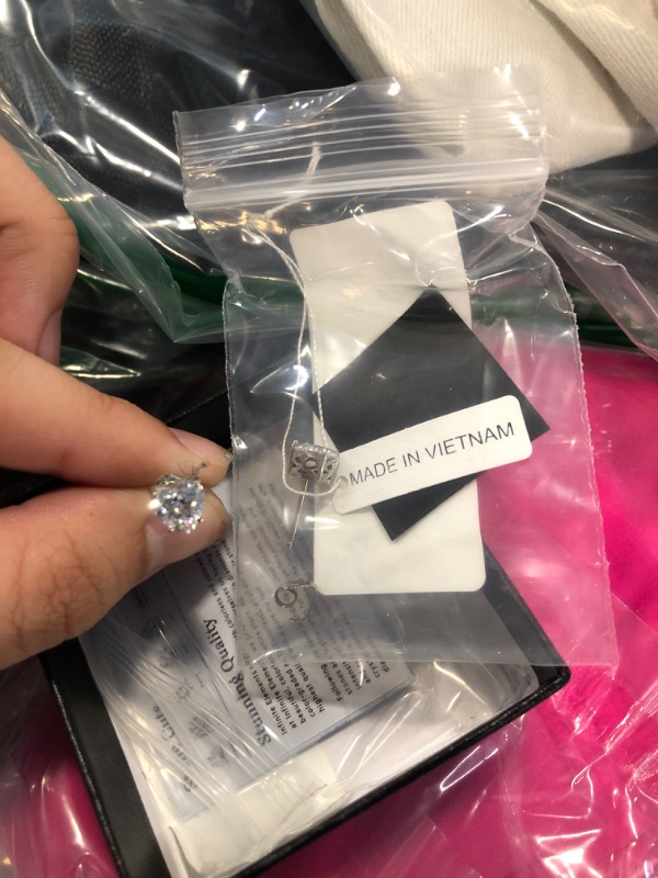 Photo 1 of Amazon Essentials Platinum Plated Sterling Silver Heart-Shape Stud Earrings made with Infinite Elements Cubic Zirconia, (previously Amazon Collection)