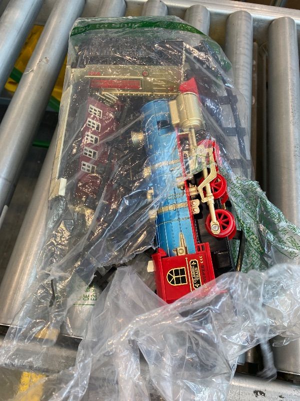 Photo 1 of *Missing Parts - Check clerk notes*
JUQU Remote Control Electric Train Set for Kids Ages 3-8 – Steam Locomotive Toy Train with Lights, Sounds, Smoke & Tracks, Christmas Tree Train Set with Cargo Cars for Around or Under Tree