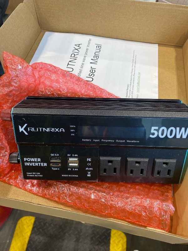 Photo 1 of **MINOR DAMAGE - USED**
RUTNRIXA Power Inverters 12V DC to 110V AC Converter for Vehicles USB-C/PD 25W Fast Charging Ports Car Charger Adapter with a Cigarette Lighter Ports Plug Outlet (Modified sine wave-500W)