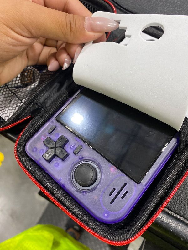 Photo 1 of **UNTESTED**
RF40H Handheld Game Console, 4.0" Retro Gaming Console Preloaded 20,000+ Classic Games, Open Source Linux System, Support WiFi Online Play, Portable Pocket Hand Held Video Game (Transparent Purple)