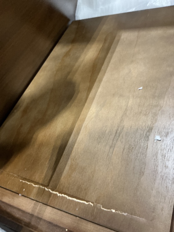 Photo 1 of *MAJOR DAMAGE*
Brown end table