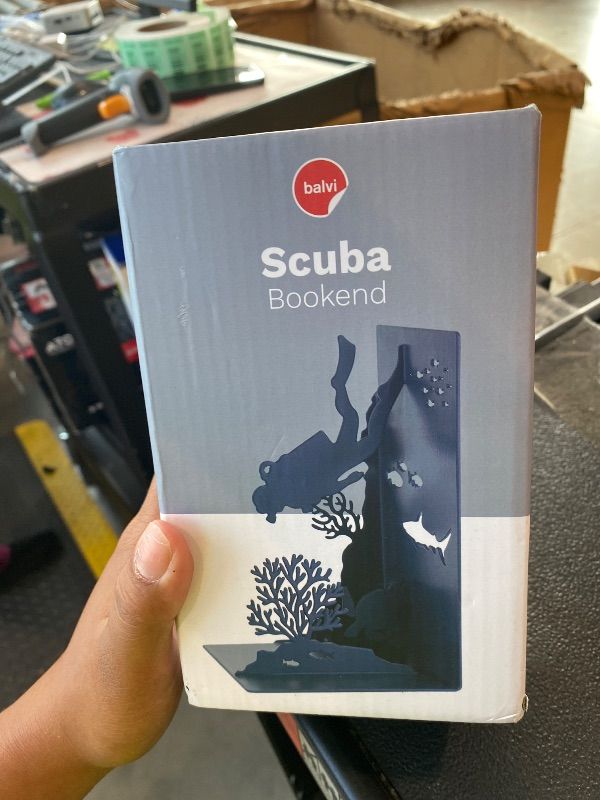 Photo 1 of **Similar item**
Scuba Bookend