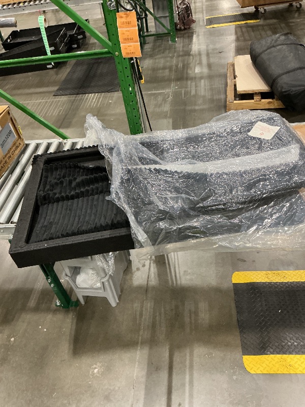 Photo 1 of *MISSING PARTS - see clerk notes*
modular black corduroy sectional sofa component.